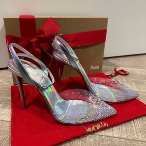 CHRISTIAN LOUBOUTIN
Spikaqueen 100 PVC and leather pumps